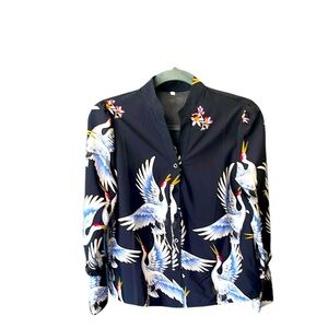 Boutique style deep navy blousejacket featuring brilliant multicolor crane print